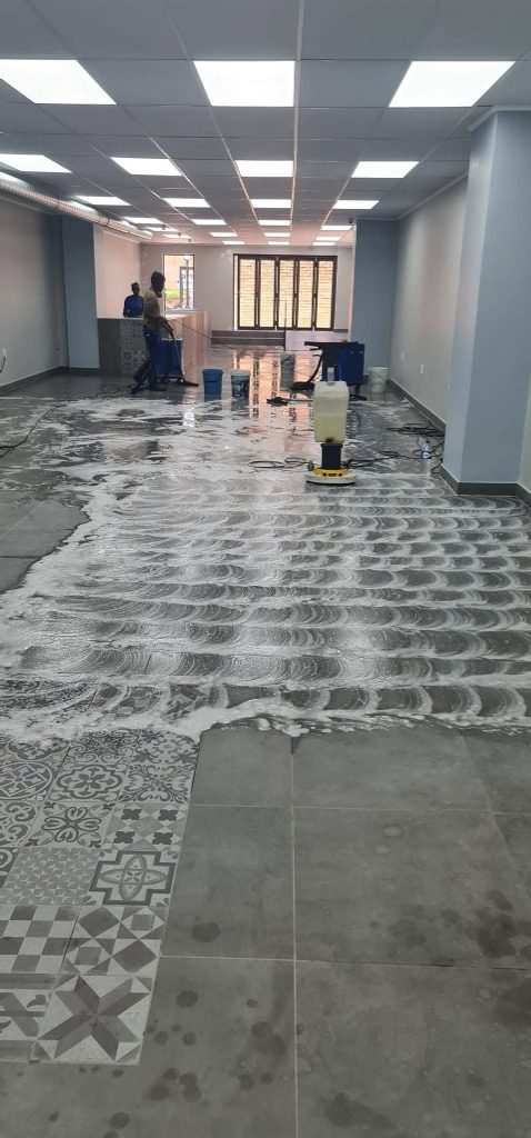 Rotary scrubber deep-cleaning a commercial office floor in Pretoria