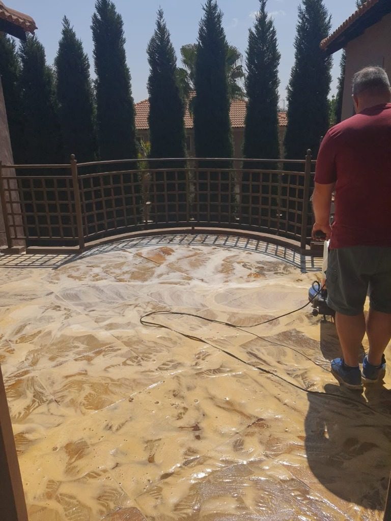 Outdoor paved entertainment area being deep-scrubbed near Pretoria